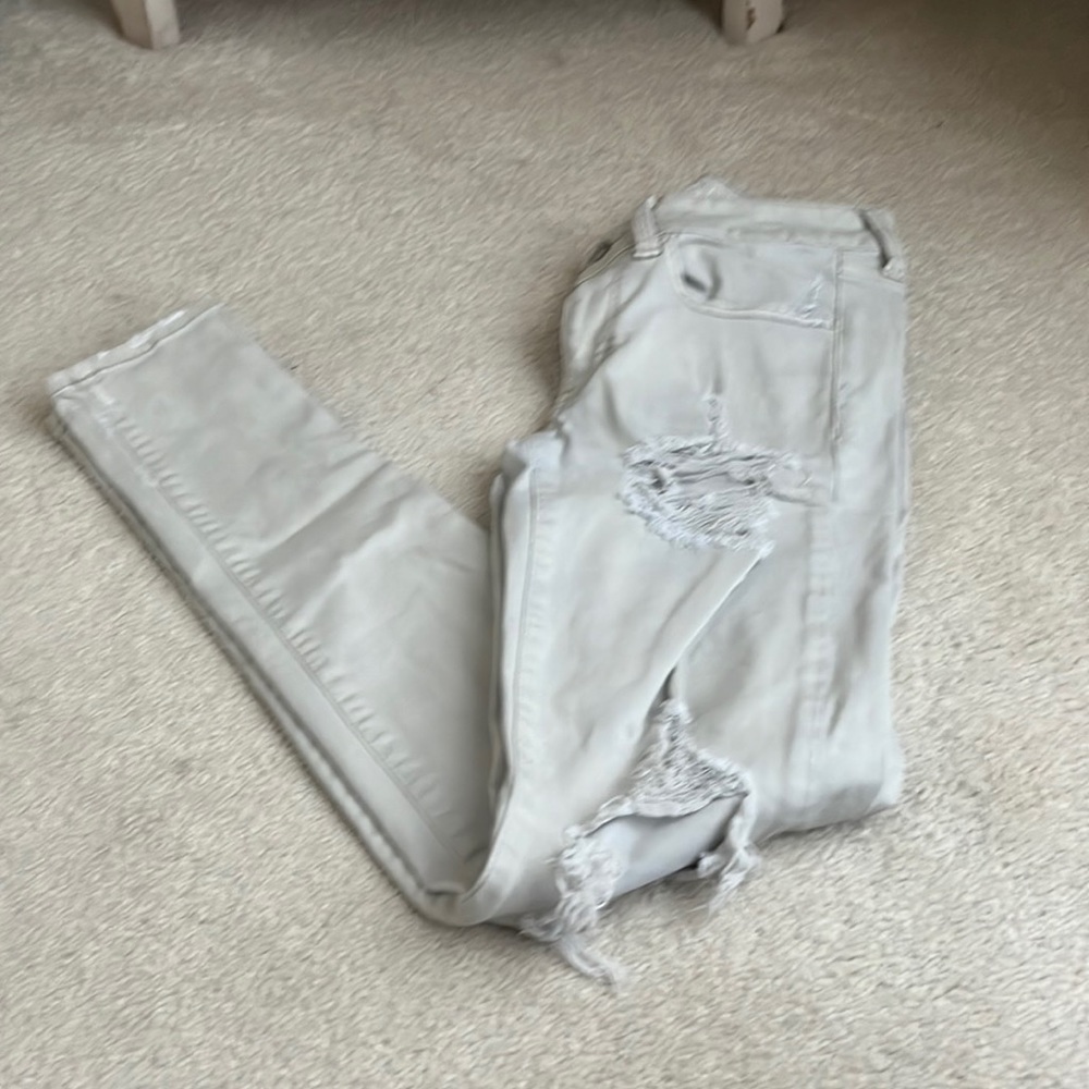AE Khaki/light tan destructed jeans, size 2
